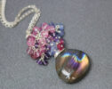 Pink Purple Labradorite with Cluster of Pink Sapphires, Tanzanites and Topaz