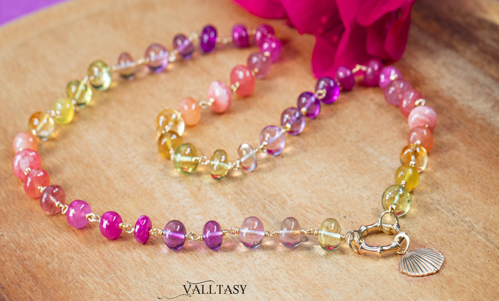Pink purple gemstone necklace.