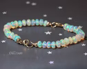 Solid Gold 14K Silk Knotted Ethiopian Opal Bracelet, Two Opal Halves Bracelet