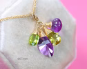 - Solid Gold 14K Amethyst and Peridot Charm with a Lobster Clasp