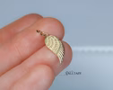 - Solid Gold 14K Angel Wing Charm