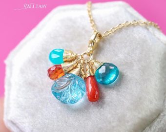 - Solid Gold 14K Carved Blue Topaz and Italian Coral Charm with a Lobster Clasp