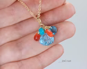 - Solid Gold 14K Carved Blue Topaz and Italian Coral Charm with a Lobster Clasp
