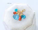- Solid Gold 14K Carved Blue Topaz and Italian Coral Charm with a Lobster Clasp