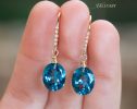 - Solid Gold 14K Diamond Oval London Blue Topaz Earrings