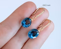 - Solid Gold 14K Diamond Oval London Blue Topaz Earrings