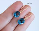 - Solid Gold 14K Diamond Oval London Blue Topaz Earrings