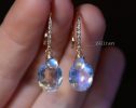 - Solid Gold 14K Diamond Oval Rainbow Moonstone Earrings