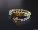 - Solid Gold 14K Ethiopian Opal Wire Wrapped Gemstone Hoop Earrings