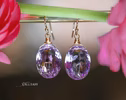 - Solid Gold 14K Genuine Pink Amethyst Oval Earrings