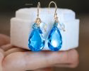 - Solid Gold 14K Large Swiss Blue Topaz and Rainbow Moonstone Earrings