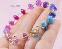 - Solid Gold 14K Purple Pink Gemstone Bracelet, Wire Wrapped Bracelet with Pink Sapphires, Rubies and Tanzanites