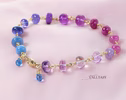 - Solid Gold 14K Purple Pink Gemstone Bracelet, Wire Wrapped Bracelet with Pink Sapphires, Rubies and Tanzanites