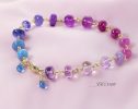 - Solid Gold 14K Purple Pink Gemstone Bracelet, Wire Wrapped Bracelet with Pink Sapphires, Rubies and Tanzanites