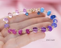 - Solid Gold 14K Purple Pink Gemstone Bracelet, Wire Wrapped Bracelet with Pink Sapphires, Rubies and Tanzanites