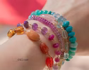 - Solid Gold 14K Purple Pink Gemstone Bracelet, Wire Wrapped Bracelet with Pink Sapphires, Rubies and Tanzanites