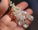 - Solid Gold 14K Rainbow Moonstone and Welo Ethiopian Opal Cascade Cluster Earrings, Long Statement Earrings