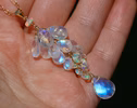 - Solid Gold 14K Rainbow Moonstone and Welo Ethiopian Opal Pendant, Cascade Statement Necklace