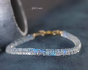 - Solid Gold 14K Rainbow Moonstone Blue Fire Bracelet, Heishi Moonstone Beaded Bracelet