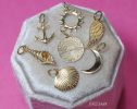 - Solid Gold 14K Sea Shell Charm