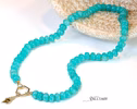 - Solid Gold 14K Silk Knotted Amazonite Necklace with a Shell Charm