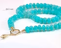 - Solid Gold 14K Silk Knotted Amazonite Necklace with a Shell Charm