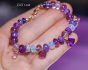 - Solid Gold 14K Silk Knotted Bracelet with Opals and Amethyst and Tanzanite
