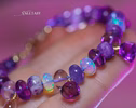 - Solid Gold 14K Silk Knotted Bracelet with Opals and Amethyst and Tanzanite