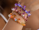 - Solid Gold 14K Silk Knotted Bracelet with Opals and Amethyst and Tanzanite