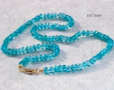 - Solid Gold 14K Silk Knotted Caribbean Blue Apatite Necklace