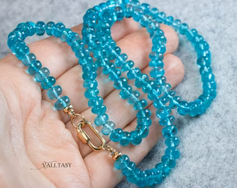 - Solid Gold 14K Silk Knotted Caribbean Blue Apatite Necklace