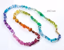 - Solid Gold 14K Silk Knotted Geometric Rainbow Multi Gemstone Necklace, Long Knotted Necklace with Multi Shaped Gemstones
