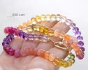 - Solid Gold 14K Silk Knotted Sunset Inspired Multi Gemstone Necklace