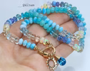 - Solid Gold 14K Silk Knotted Topaz, Larimar, Aquamarine and Opal Necklace