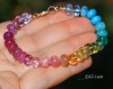 - Solid Gold 14K Silk Knotted Unicorn Colorful Bracelet, Multi Gemstone Bracelet in a Vivid Rainbow
