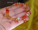 - Solid Gold 14K Spicy Silk Knotted Bracelet with Opals and Peach, Yellow Orange Gemstones