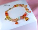 - Solid Gold 14K Spicy Silk Knotted Bracelet with Opals and Peach, Yellow Orange Gemstones