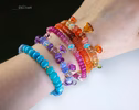 - Solid Gold 14K Spicy Silk Knotted Bracelet with Opals and Peach, Yellow Orange Gemstones