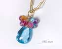 - Solid Gold 14K Topaz Charm with a Multi Gemstone Cluster