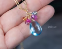 - Solid Gold 14K Topaz Charm with a Multi Gemstone Cluster