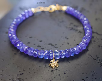 - Solid Gold 14K Tanzanite Bracelet with a Diamond Turtle Charm