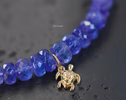- Solid Gold 14K Tanzanite Bracelet with a Diamond Turtle Charm