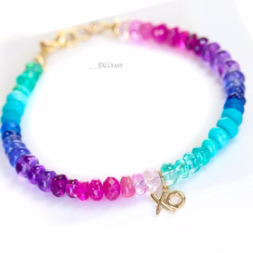 The Hugs & Kisses Bracelet - Solid Gold 14K Multi Gemstone Bracelet with XO Charm The Hugs & Kisses Bracelet - Solid Gold 14K Multi Gemstone Bracelet with XO Charm