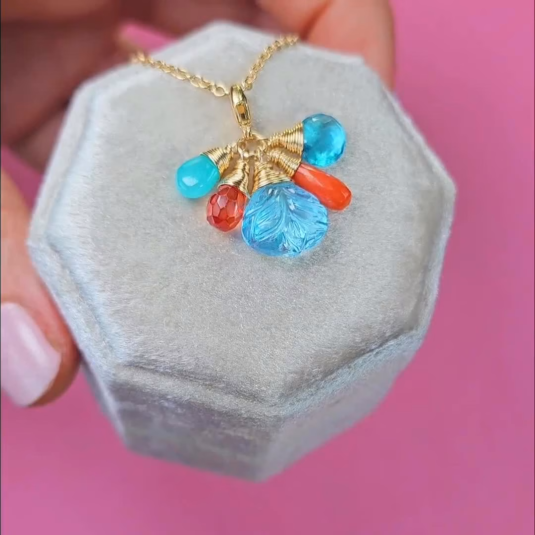 - Solid Gold 14K Carved Blue Topaz and Italian Coral Charm with a Lobster Clasp