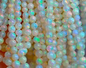 - Dainty Ethiopian Opal Sphere Bracelet in Gold Filled