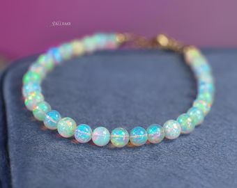 - Dainty Ethiopian Opal Sphere Bracelet in Gold Filled