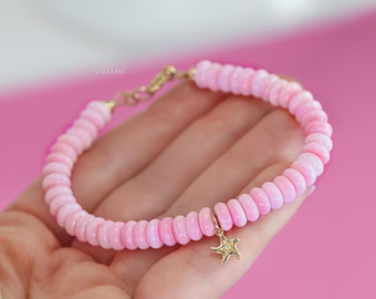 - Solid Gold 14K Angel Skin Pink Coral Bracelet with a Diamond Starfish Charm