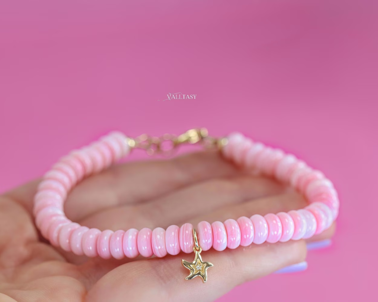 - Solid Gold 14K Angel Skin Pink Coral Bracelet with a Diamond Starfish Charm