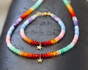 - Solid Gold 14K Multi Opal Bracelet: Mexican Fire Opal, Pink Opal, Blue Opal with a Diamond Starfish Charm